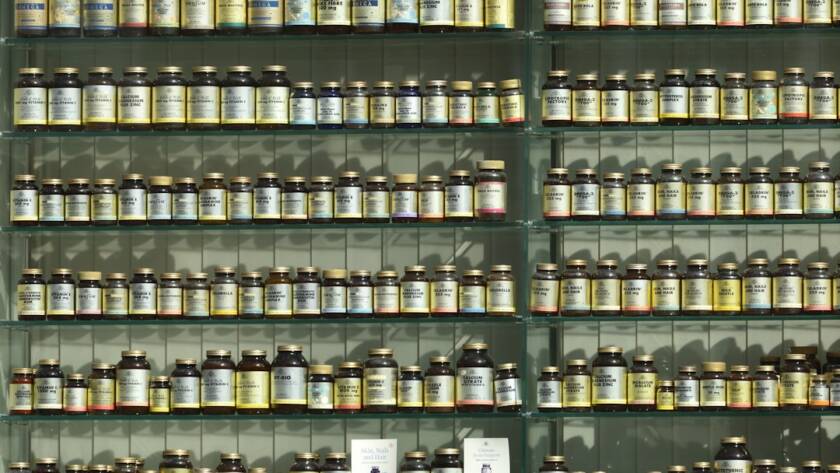 Pharmacy shelves with natural health products