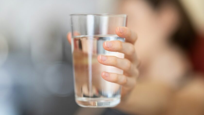 Glass of water for taking liposomal supplements