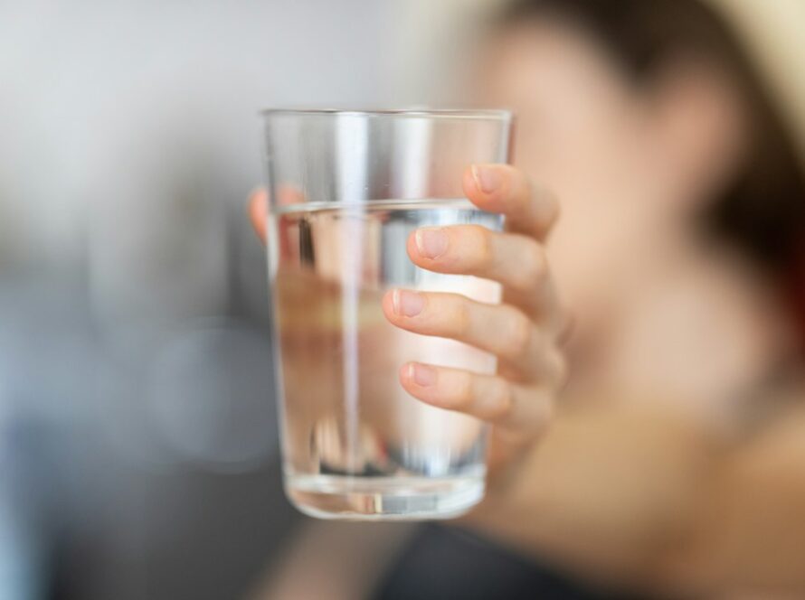 Glass of water for taking liposomal supplements