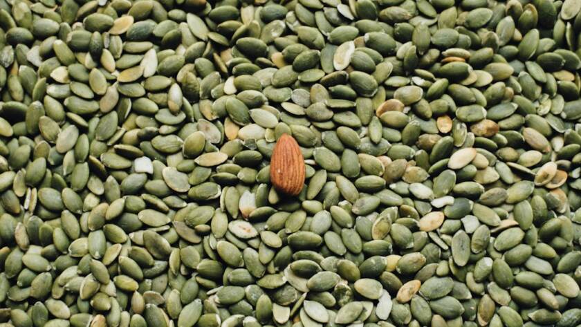 Almonds and pumpkin seeds, food sources of magnesium