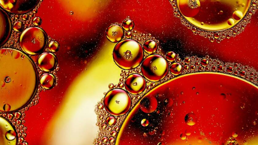 Oil droplets in water illustrating lipid delivery systems