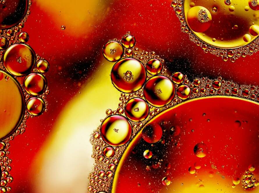 Oil droplets in water illustrating lipid delivery systems
